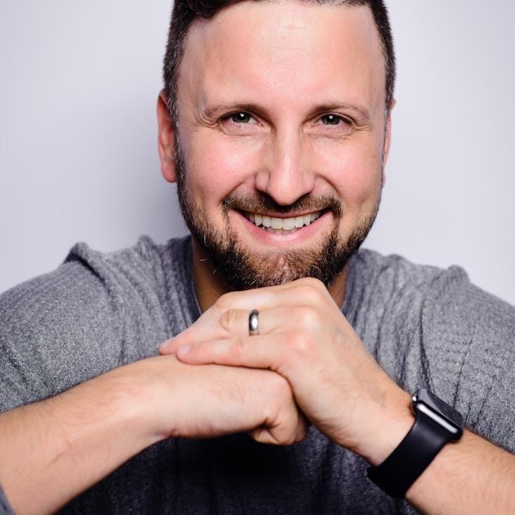 Kaveri Mehta, Lead Design Curator at LeafCinderFern, reviewing corporate floral arrangements